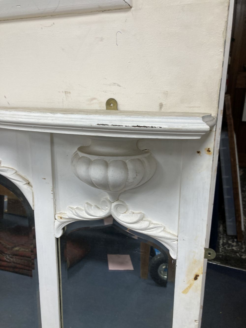 A late Victorian white painted overmantel mirror, width 128cm height 116cm